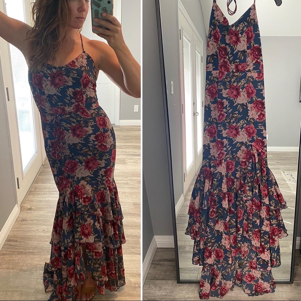 Stunning Floral halter dress with tie up back and zipper.